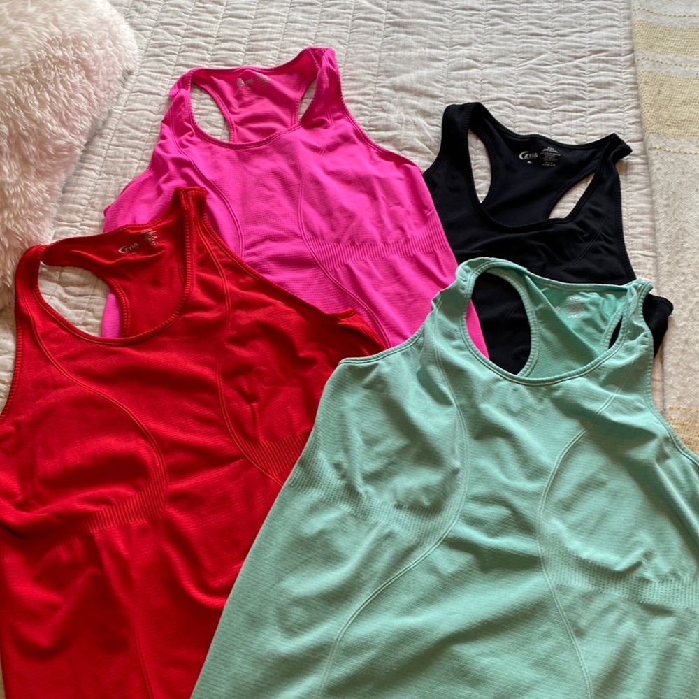 Four XL Zyia tank tops